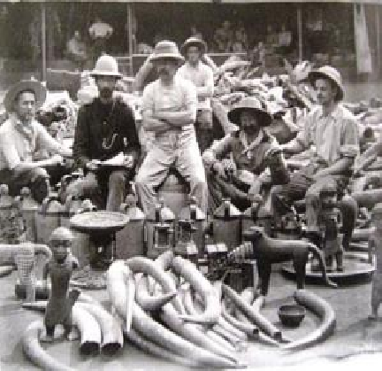 British soldiers of the infamous Punitive Expedition of 1897 proudly posing with the looted Benin artefacts.