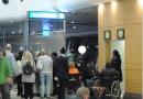 The tall white man and Checkport employees at a boarding gate of SAA flying from Johannesburg to Frankfurt, 2017. © O.K.